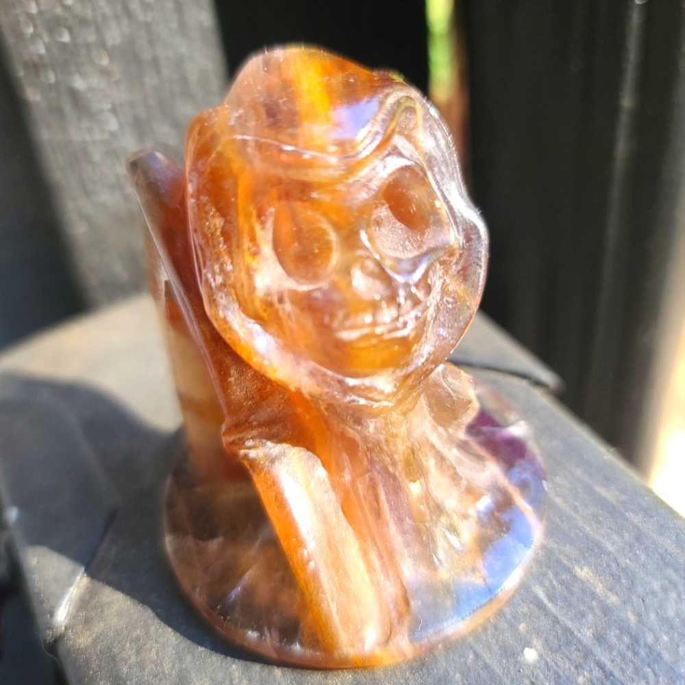 Fluorite handcarved skull Grim Reaper crystal